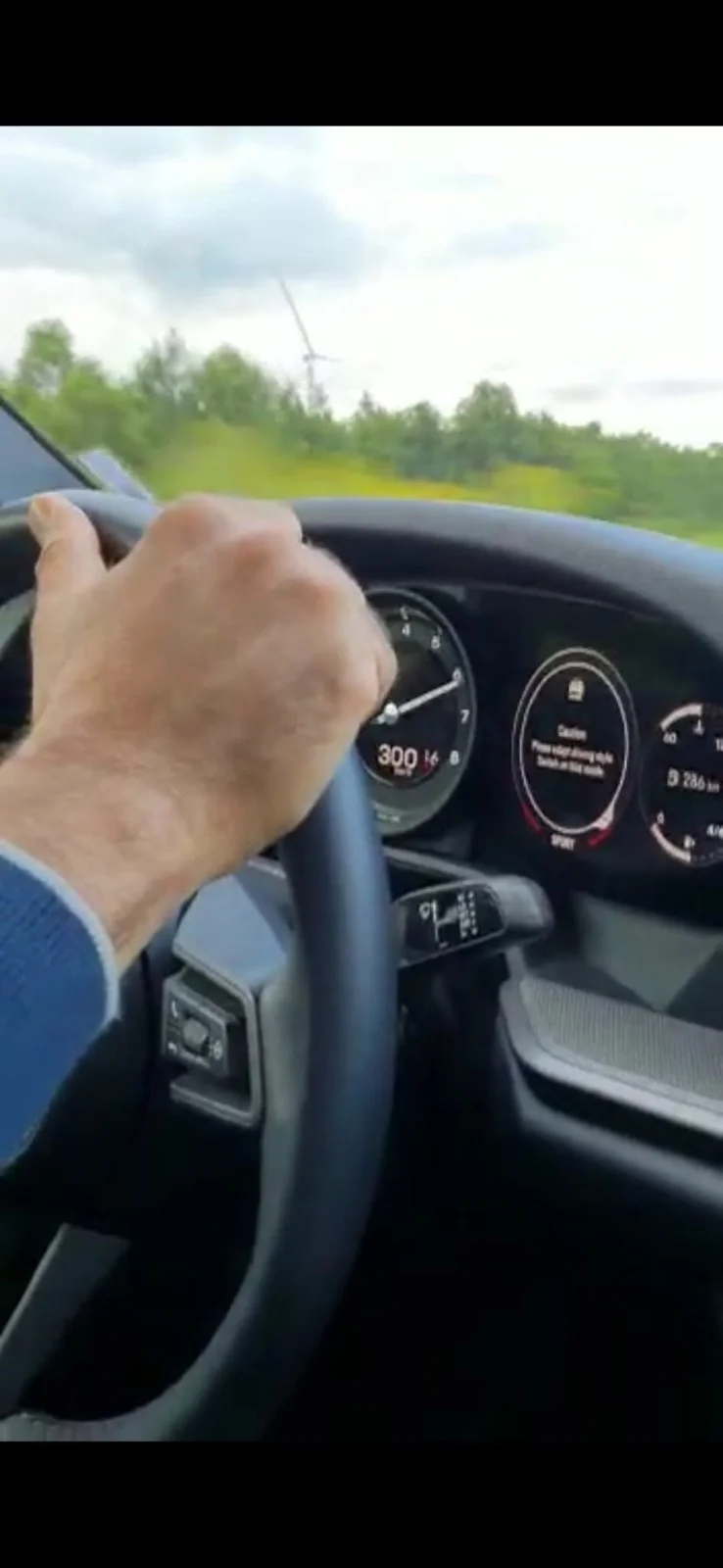 Cockpit view at 300 km/h with telemetry HUD