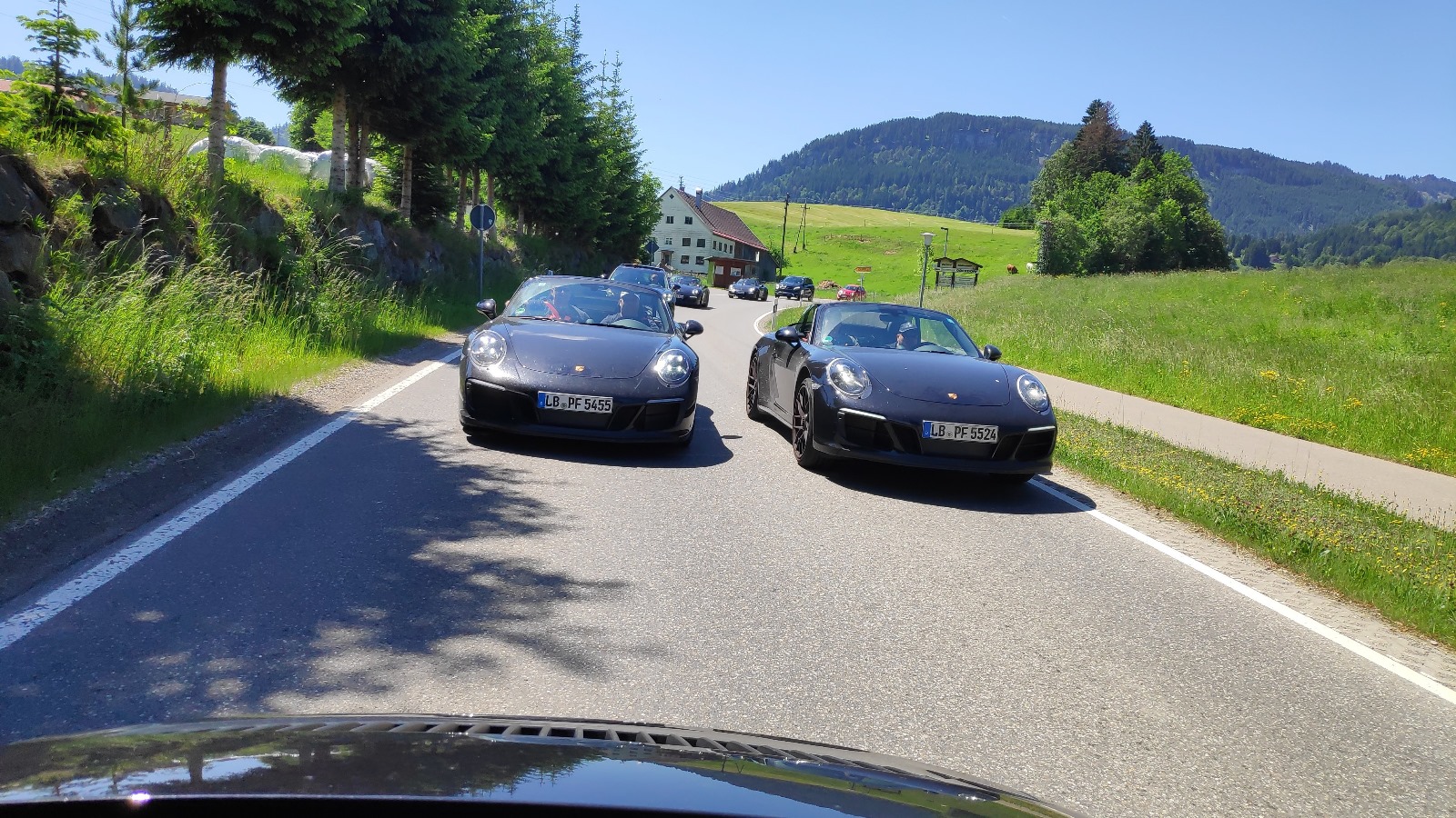 Two Porsche 911s side by side