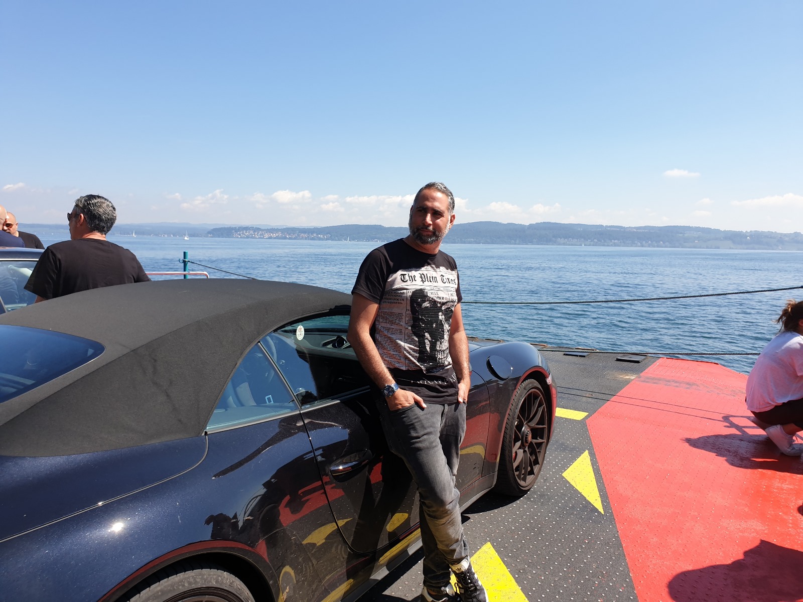 Porsche on lake ferry